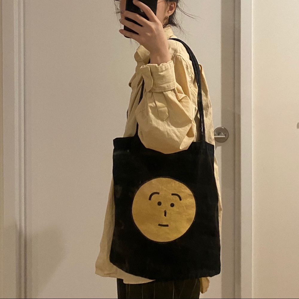 Smiley face black Canvas tote bag